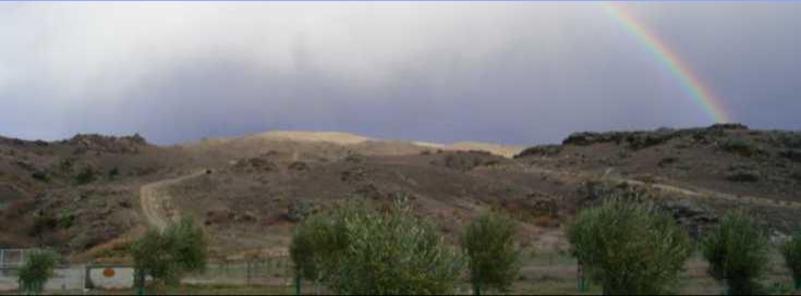 Rainbow over the Cairnmuir Mountains